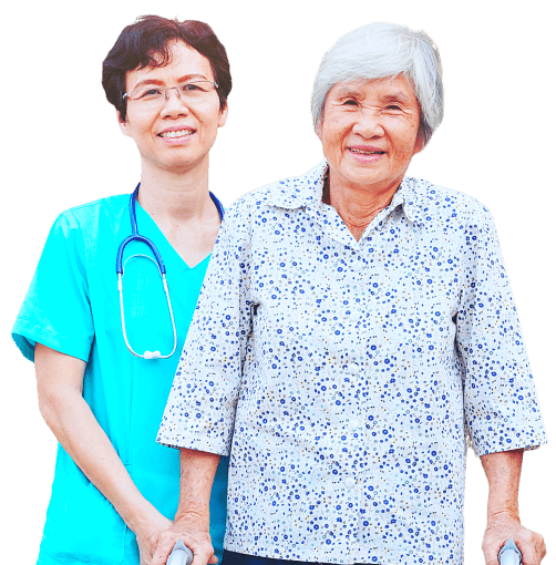 elder woman assisted by a nurse smiling